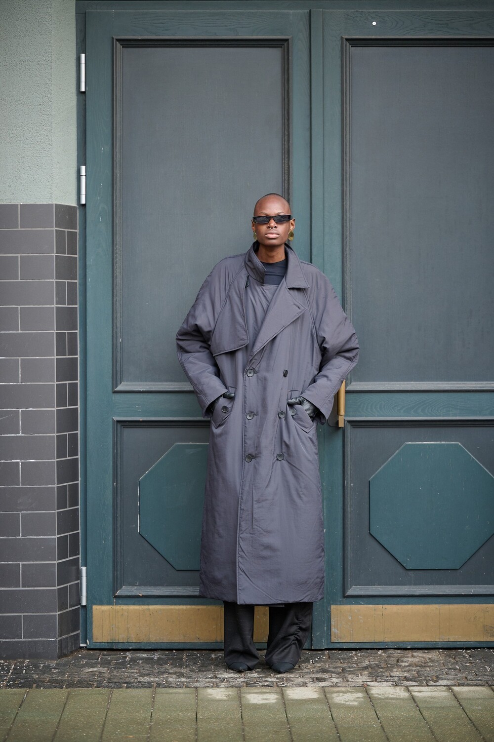 Insulated coat made of raincoat fabric